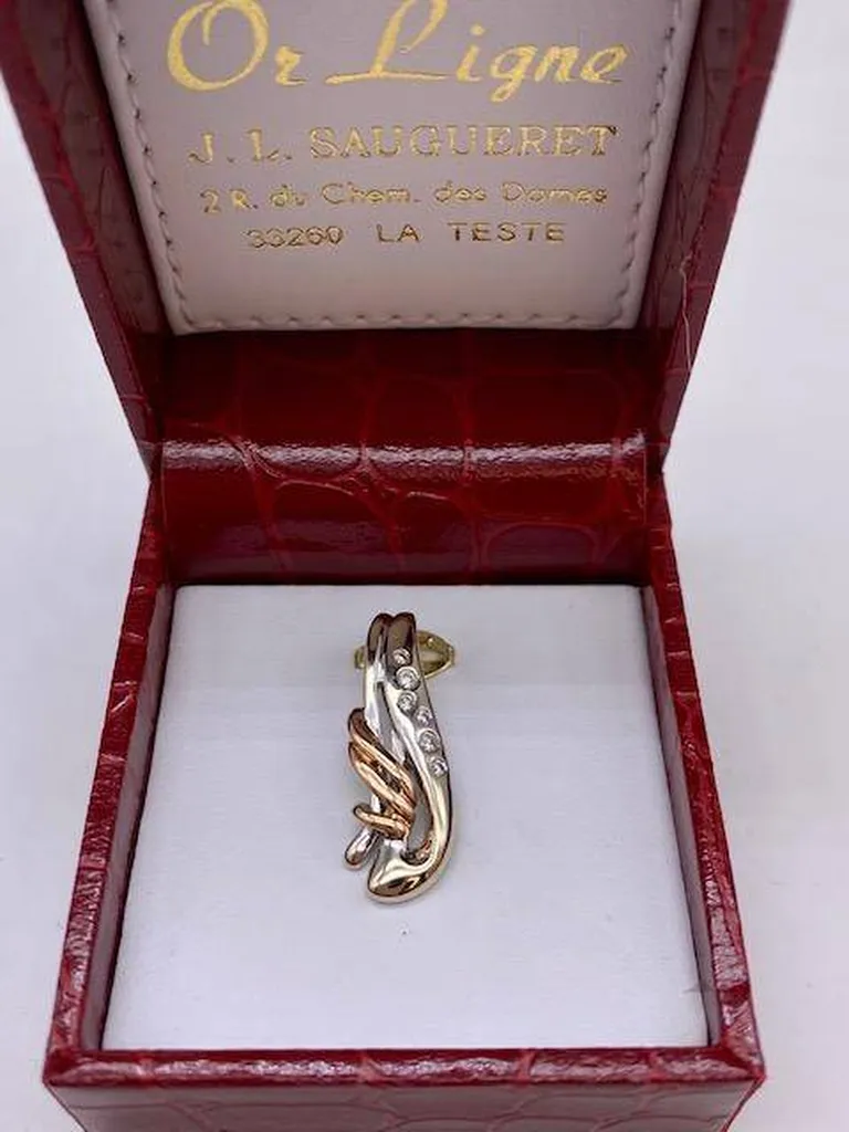 Pendentif vague en or gris et rose 750/1000ème et diamants en dépôt vente chez Or Ligne à La Teste sur le Bassin d'Arcachon