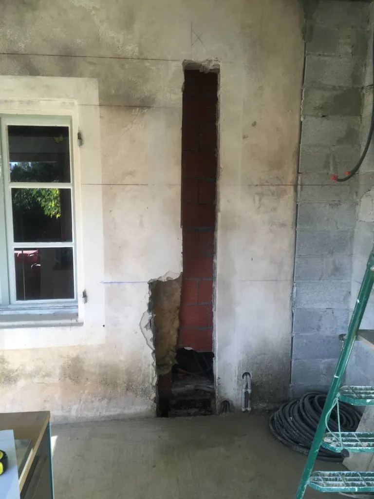Ouverture dans un mur porteur d'une maison individuelle à Grans