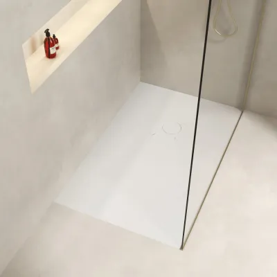 Trouvez un receveur de douche en pierre naturelle design et personnalisable dans nos showrooms Le Comptoir du Sol près de Rouen et Dieppe.