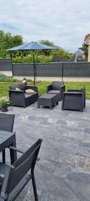Découvrez notre sélection de carrelage extérieur imitation pierre naturelle pour vos terrasses à Bourgtheroulde-Infreville, non loin de Rouen.