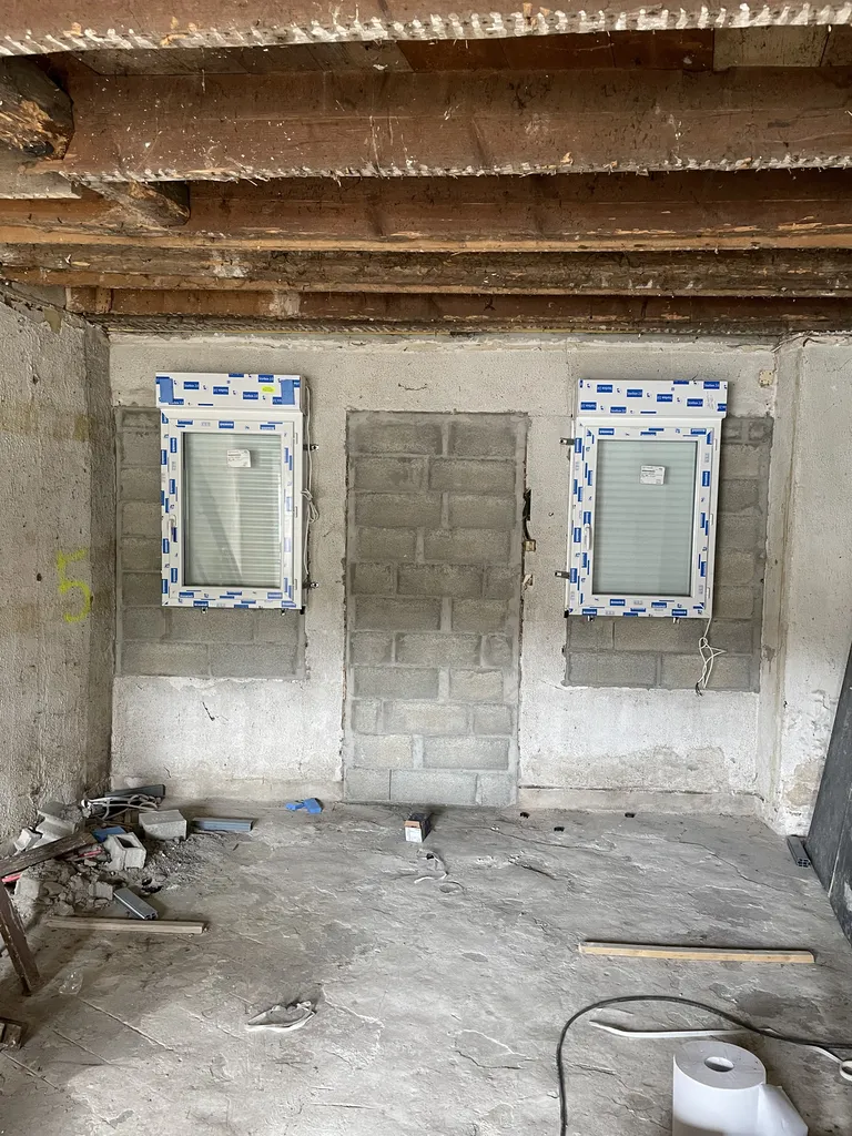 Bouchage des anciennes portes et fenêtres avant pose de nouvelles menuiseries