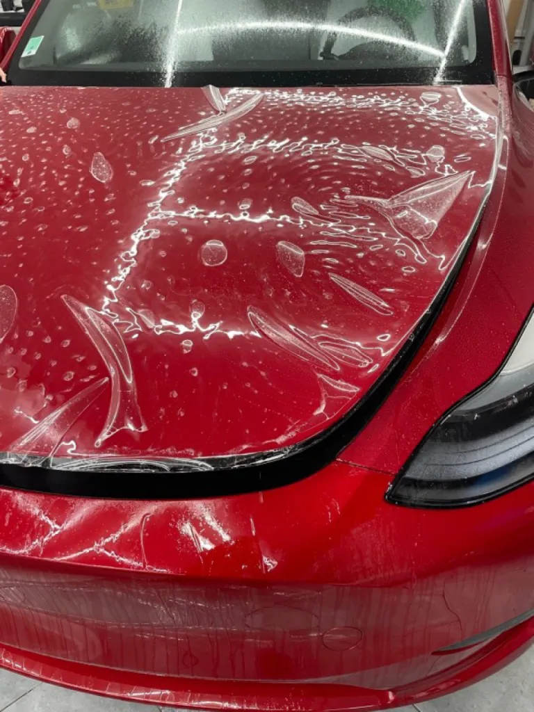 Devis personnalisé pour la pose d'un film de protection PPF XPEL sur une Tesla Model Y près de Monaco dans les Alpes-Maritimes