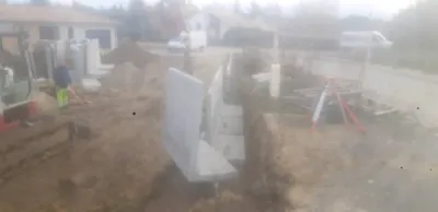 Création mur de soutiennement en L béton préfabriqué chez un particulier sur la commune de La Brède