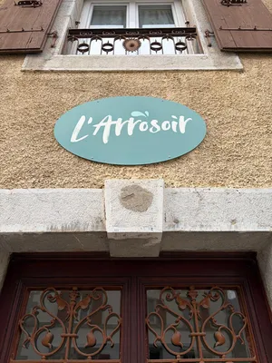 Création et pose d’une enseigne publicitaire pour l’entreprise L'Arrosoir à Noiraigue (Val-de-Travers)