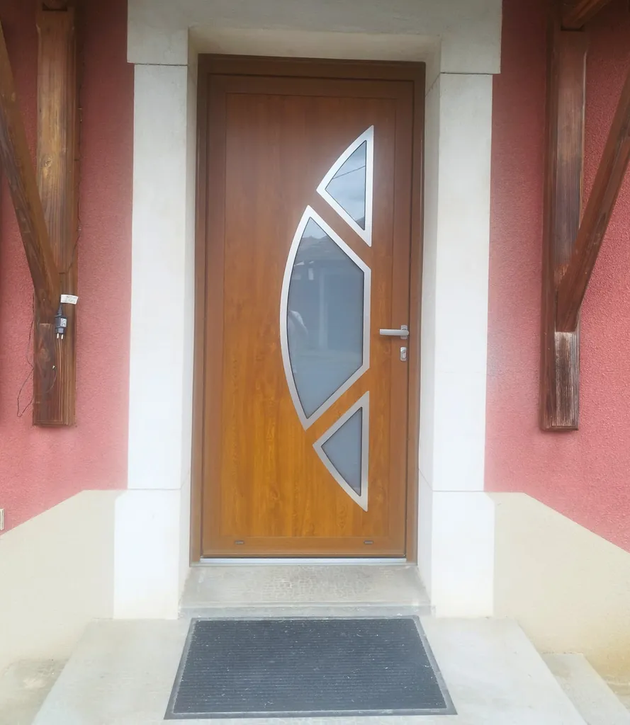 Porte d'entrée alu 3 Baies coloris extérieur imitation bois avec inserts inox et vitrage à Andrézieux-Bouthéon (Loire)