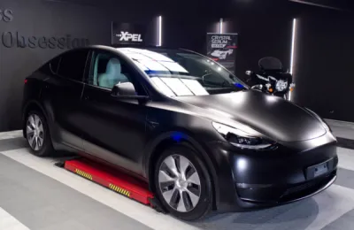 Comment protéger ma Tesla Model Y Noire avec un Film de protection Xpel Stealth Mat après la livraison de mon véhicule Neuf.