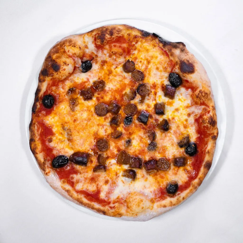 Pizzas au feu de bois à déguster sur place, à emporter ou livraison