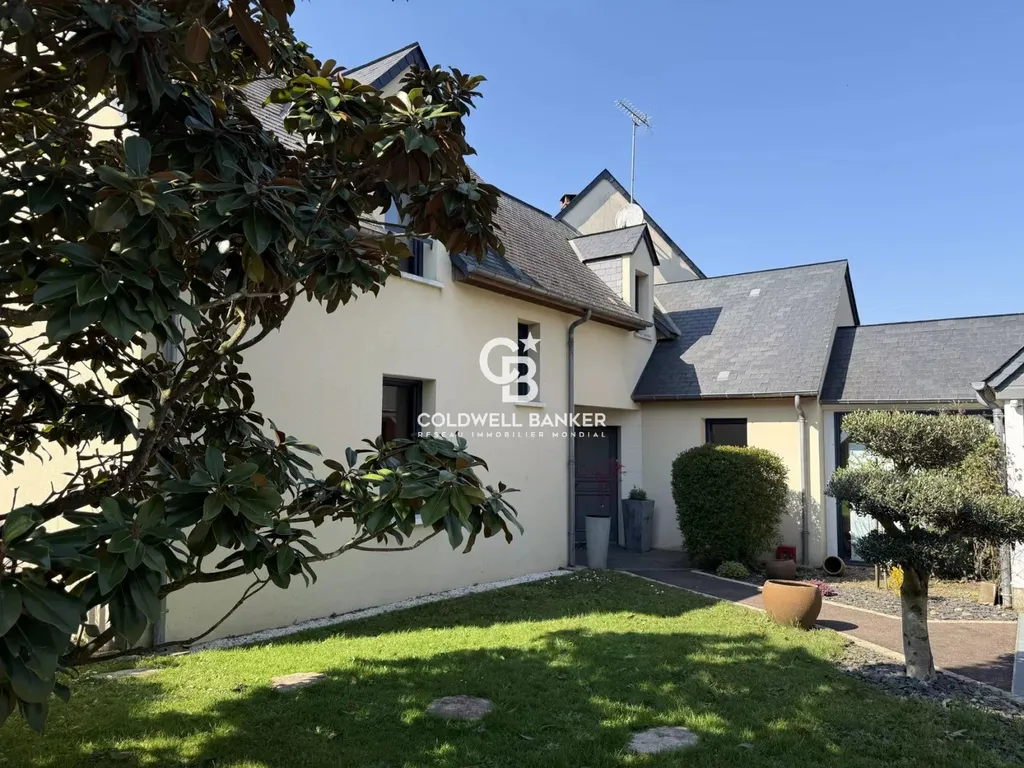 bien immobilier Le Mans avec parc arboré et espace détente extérieur