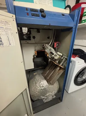 Entretien d’une chaudière au sol à tirage naturel de marque Chauffage Français type Oxane à Drancy