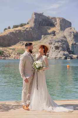Cession de couple mariés sur la plage à Lindos Grèce
