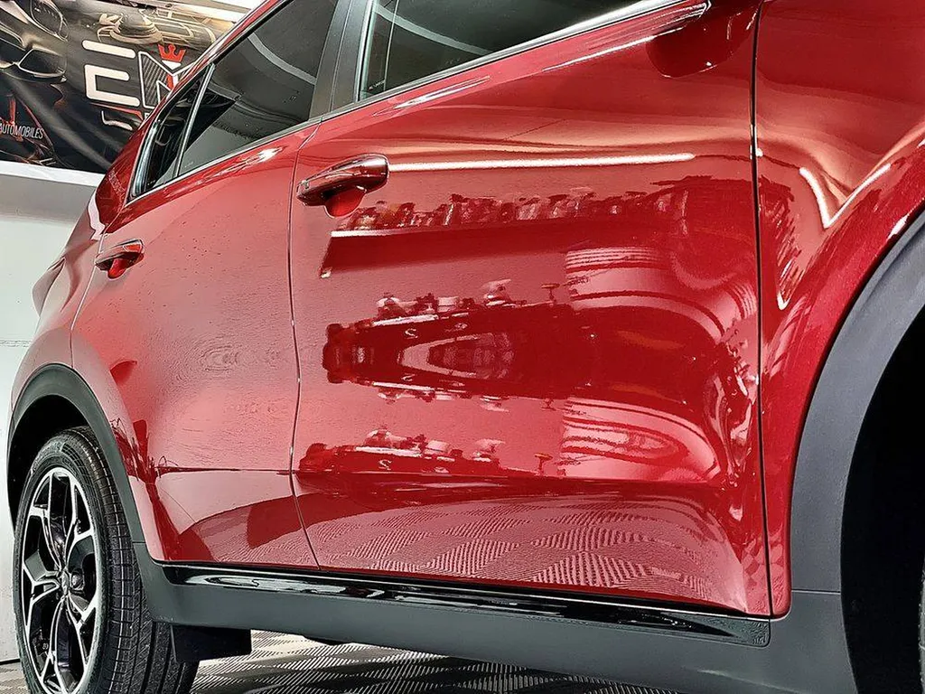 Rayures voiture sur la carrosserie rouge Rhone alpes