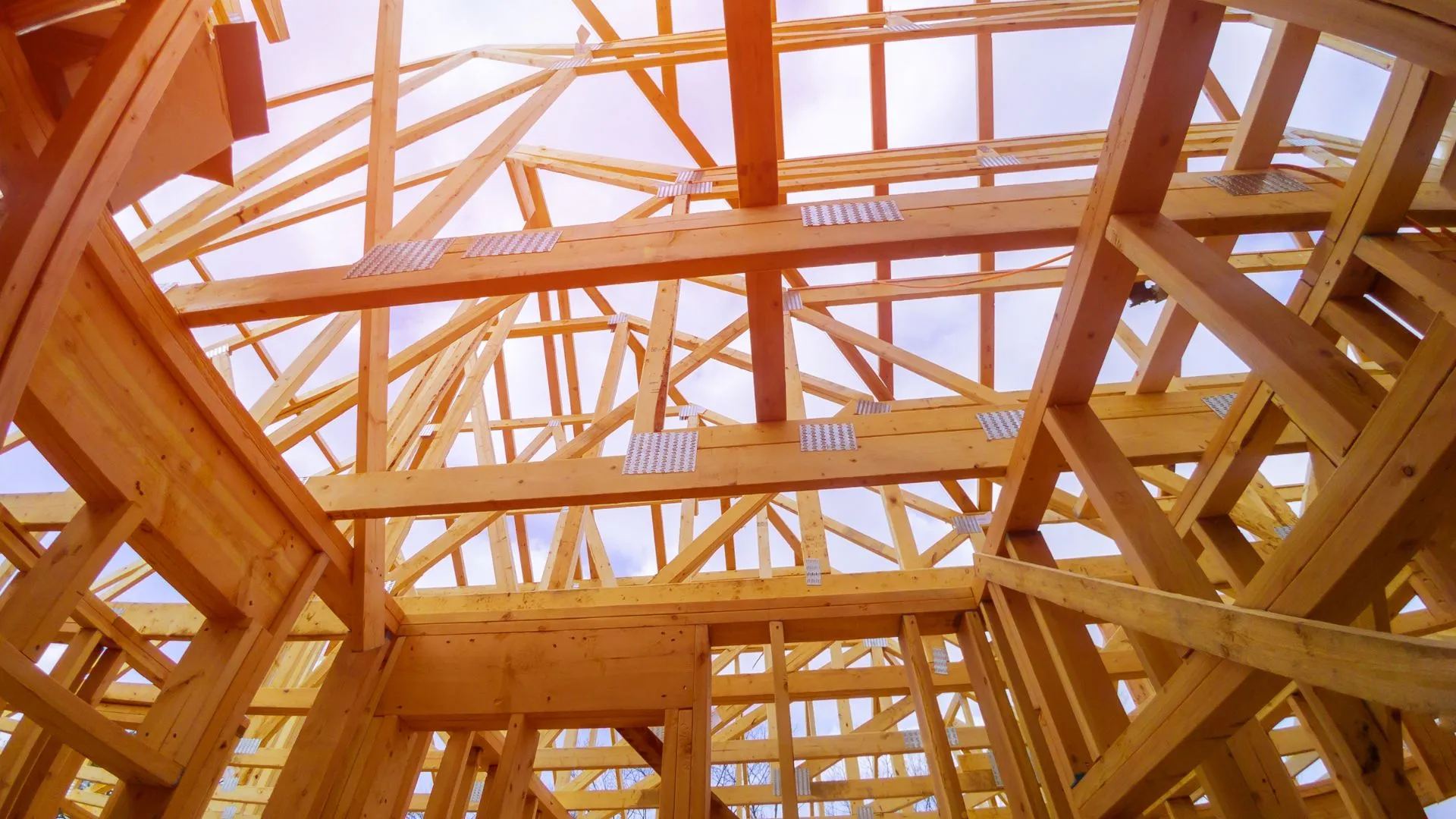 Extension ossature bois pour maison familiale à Pessac : ajouter une pièce de vie lumineuse avec toit terrasse végétalisé