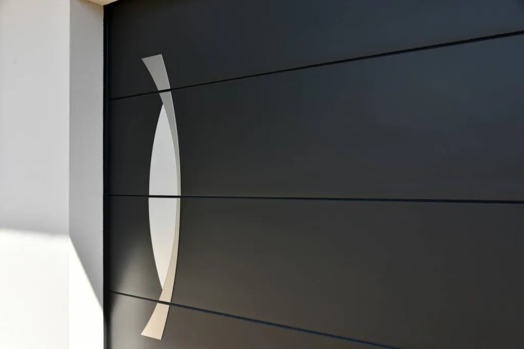 Pose de porte de garage enroulable et sectionnelle sur mesure