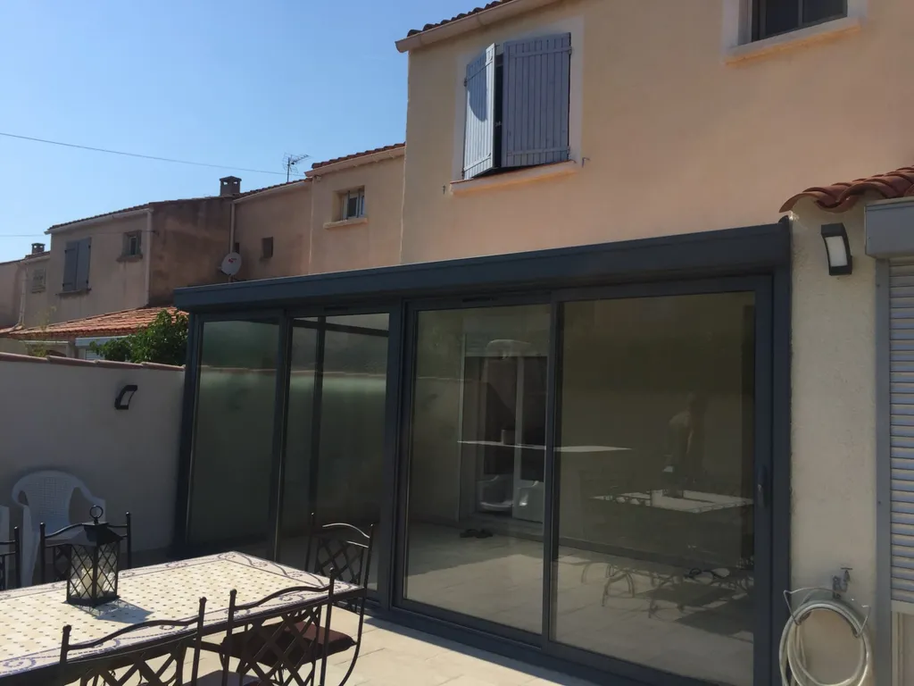 Véranda avec porte coulissante sur Châteauneuf-les-Martigues