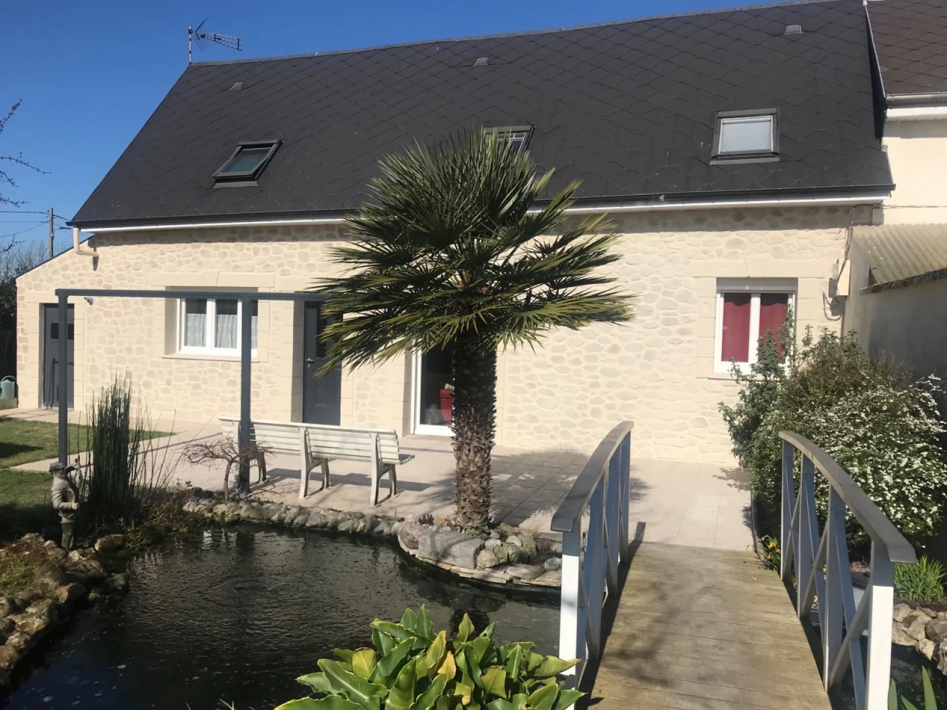 Ravalement enduit de façade aspect pierre maison de caractère port Jerome sur Seine proche Le Havre 