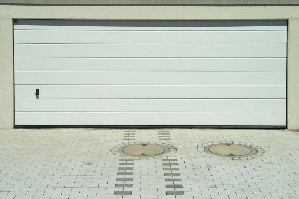 Faire poser une porte de garage à Elbeuf 76.