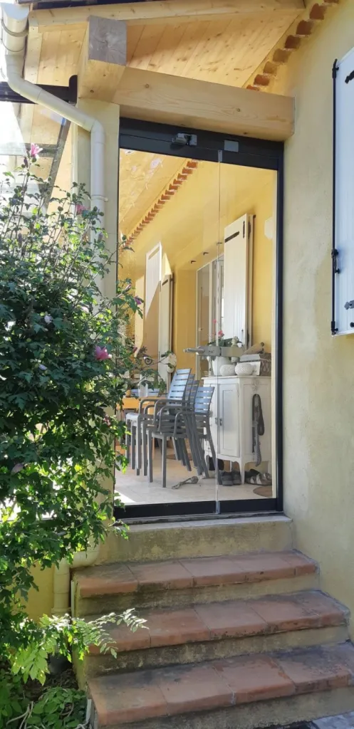 Porte en verre pour fermeture de terrasse 