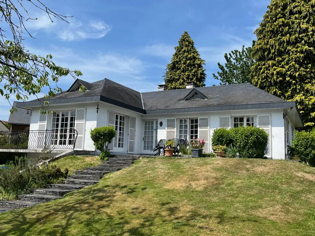 Maison en L avec terrasse