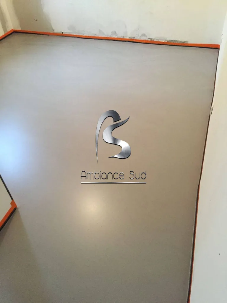 SOL EN COUCHE D'USURE TEINTE A BOUC BEL AIR