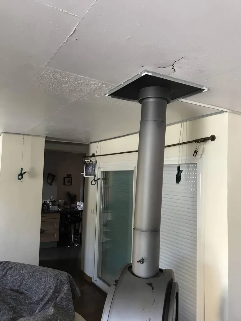 Intégration d'un poêle dans un plafond tendu BARRISOL sur Roques