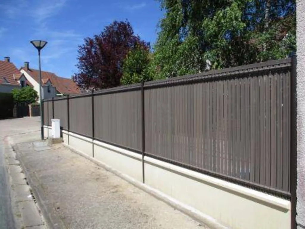 Installation de lames PVC sur clôture rigide dans l'Eure 27