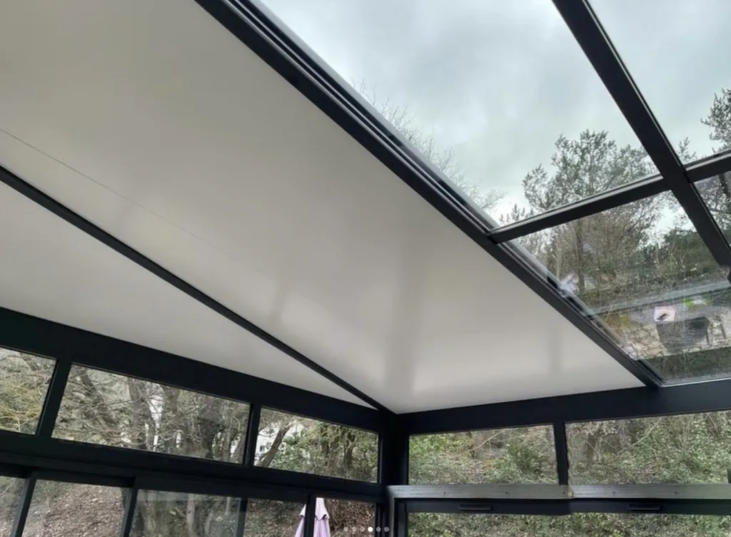 véranda en aluminium Technal de couleur noire près d' Aix en Provence