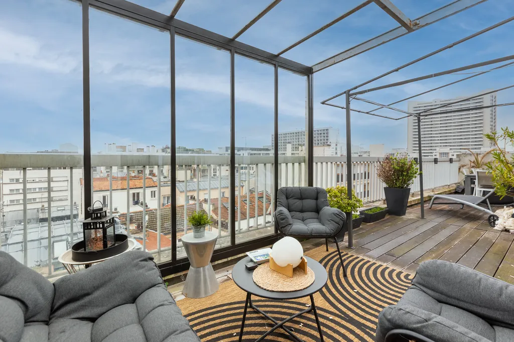 Appartement en dernier étage avec terrasses 75015 