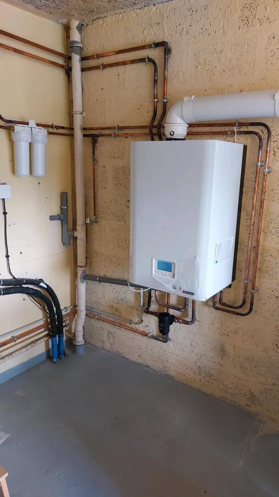 Chauffagiste RGE Dieppe : Suppression d’une Pompe à Chaleur pour une chaudière Frisquet au gaz naturel.