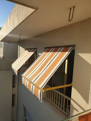 pose d'un store à bras droits sur mesure à Nice