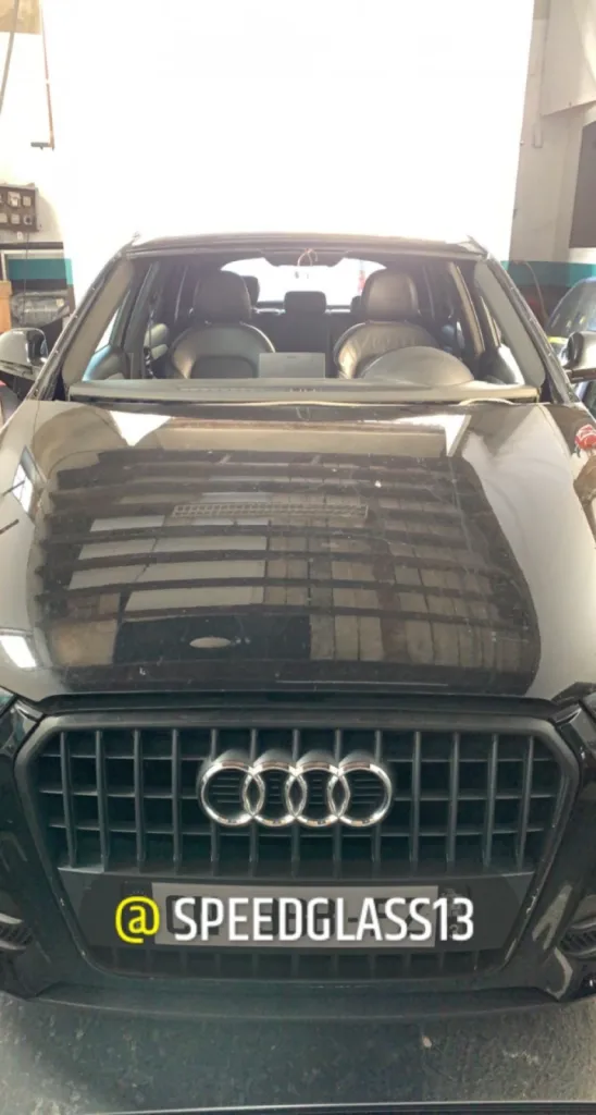Changement de pare-brise sur un Audi Q3 suite à vandalisme avec franchise offerte à Marseille 13006