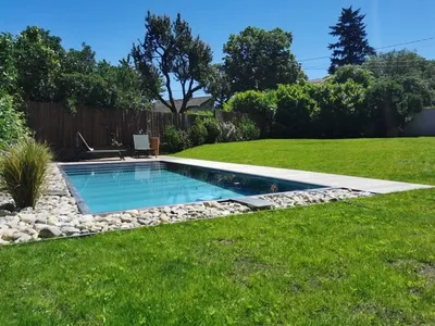 Construction d'une piscine en inox de 3m par 7,5m avec skimmer miroir et traitement bio à Tassin la Demi Lune dans l'Ouest Lyonnais