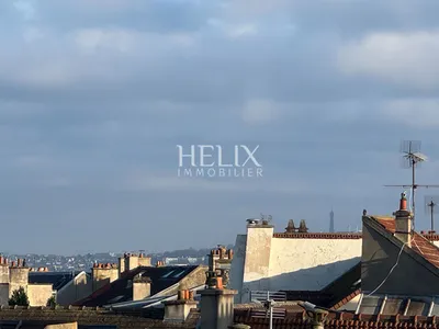 Vue Tour Eiffel centre ville à Saint Germain en Laye, magnifique appartement agrémenté d'une terrasse 