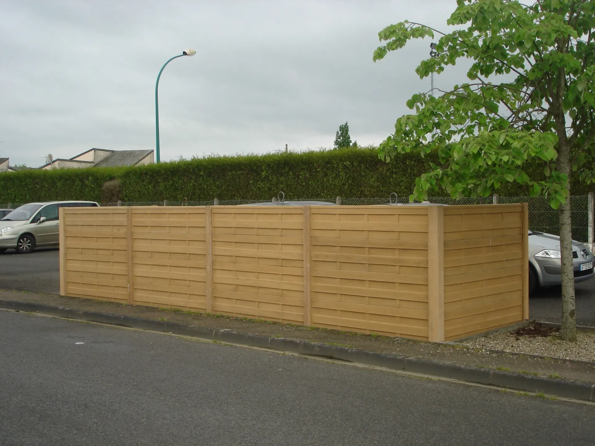 Pose de mur imprimé cache containers 