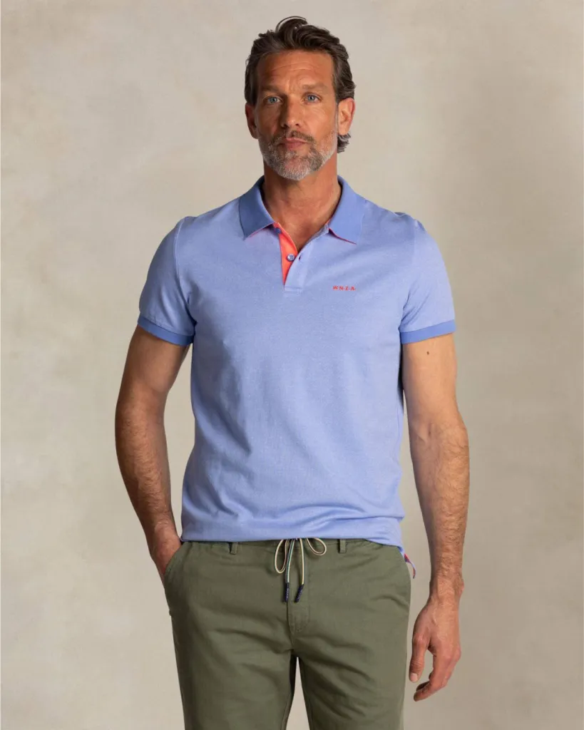Comment Porter un Polo NZA New Zealand Auckland Bleu Clair Détails Orange à Dieppe en Seine-Maritime avec Style ?