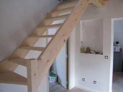 Création d'un escalier en bois sur mesure en quart tournant pour un client à Eguilles