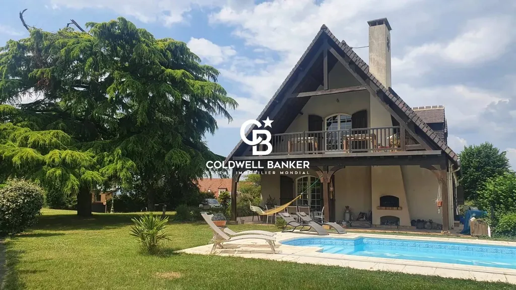 Acheter une maison de famille avec un parc arboré et grande piscine chauffée et sécurisée