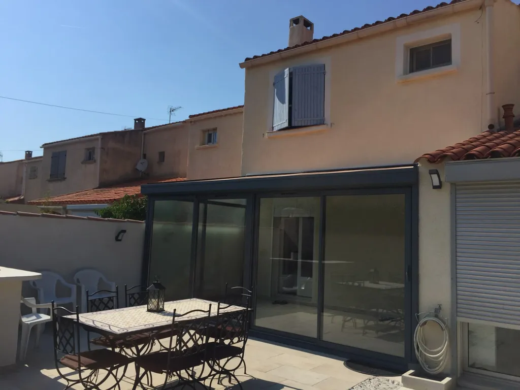 Véranda avec porte coulissante sur Châteauneuf-les-Martigues