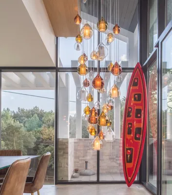Concept Verre des luminaires d'intérieur d'exception  au style épuré, une équipe de designers passionnés et un grand respect des créations des maîtres verriers.