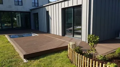 Création et pose d'un spa inox de 2x3m avec 4-5 places avec terrasse coulissante pour une protection et fermeture solide à Pléneuf Val André en Bretagne