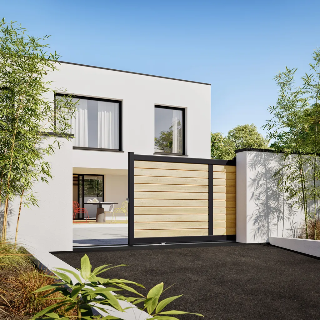 Portail coulissant aluminium aspect bois par Aquit'M installé sur mesureprès du bassin d'Arcachon