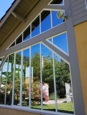 Devis pour création de fermeture véranda dans une maison individuelle dans les Monts d'Or proche de Lyon