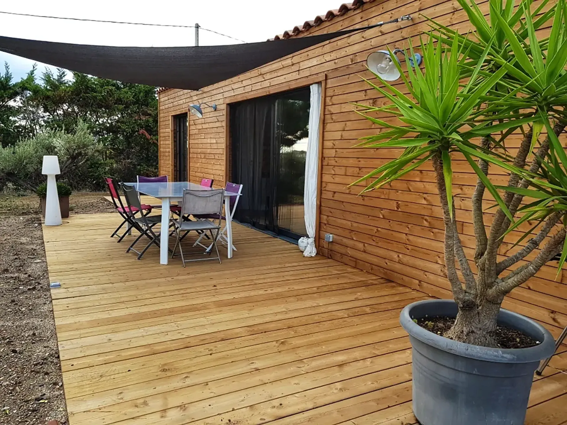 Construction d’une maison à ossature bois sur-mesure pour habitat écologique et confortable à Agde