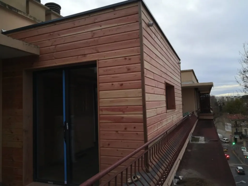 Construction d’un salon en ossature bois isolée et menuiseries aluminium chez un particulier à Montpellier dans l'Hérault 34