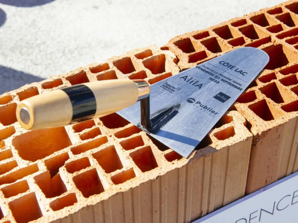 Photographe Pose de Première Pierre 
