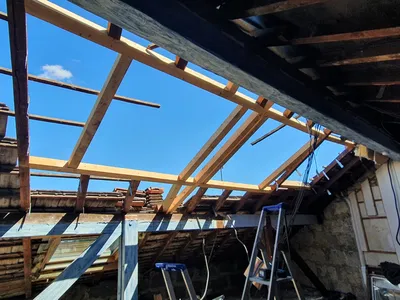 création chevêtre en charpente pour réception plusieurs Velux à Gradignan