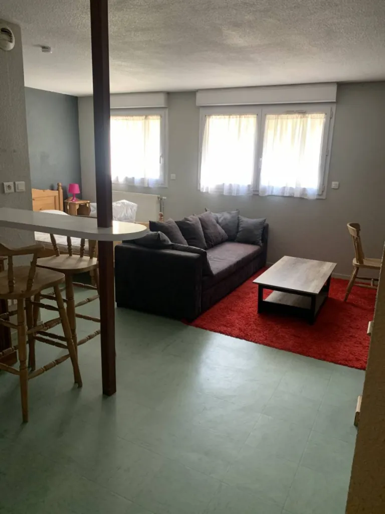 Appartement comprenant une place de stationnement