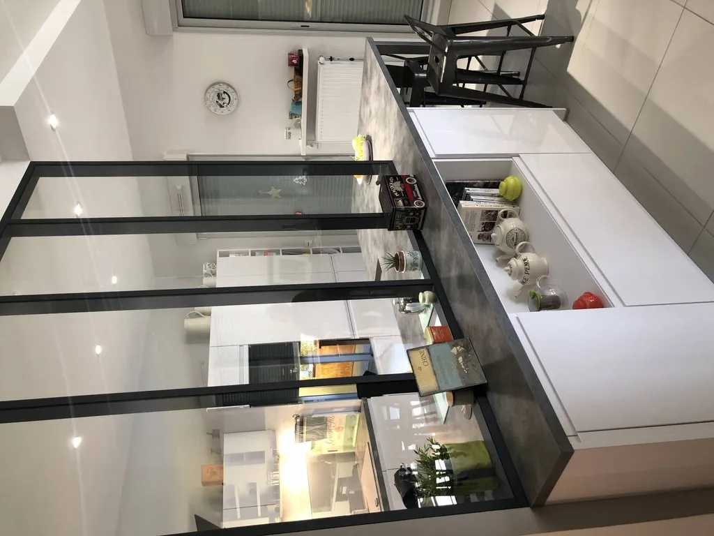 Réalisation d'une cuisine moderne sur mesure dans un appartement à Lyon