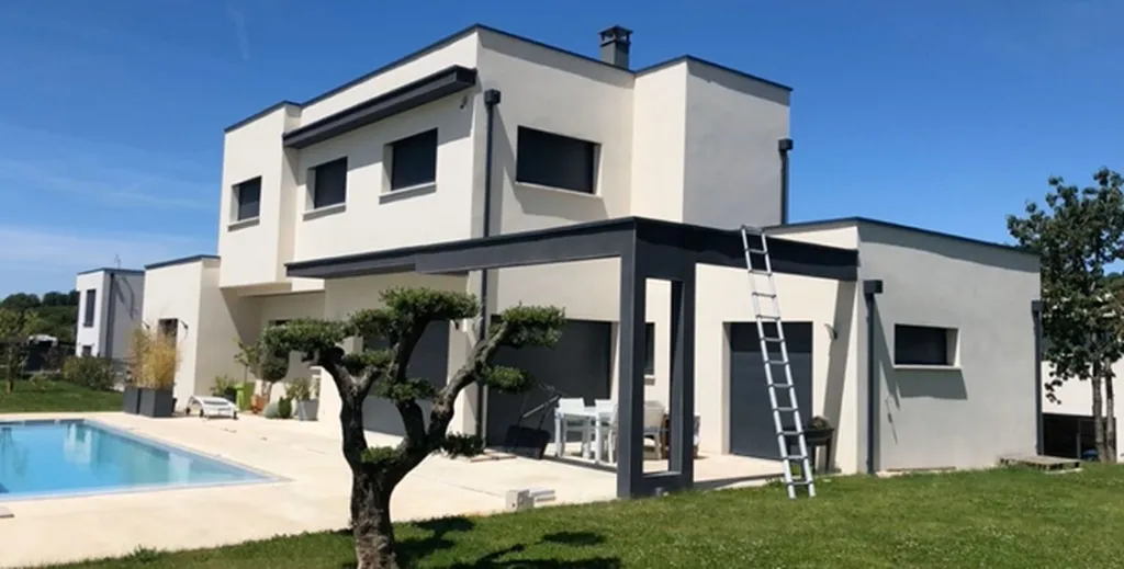 Pose d'enduit grattée sur maison neuve Andrézieux-Bouthéon (42)