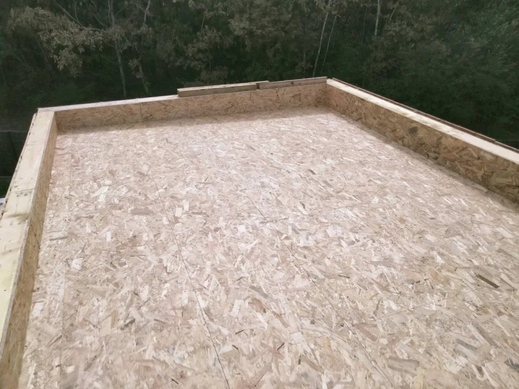 Construction extension bois à toit plat à 30m2 à Mios sur le Bassin d'Arcachon