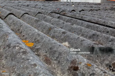 Tole fibro amiantée dépose dans le protocole amiante Track déchets Veolia Oréduit partenaire de HCPR